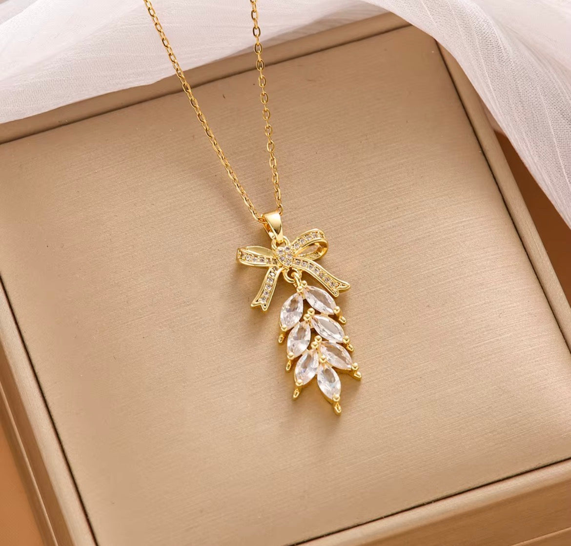 Crystal Bow Tassel Necklace