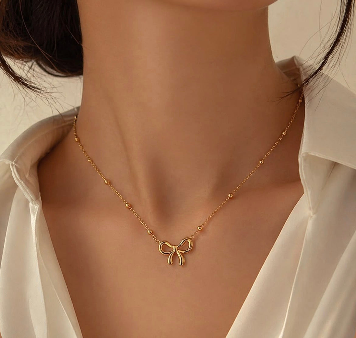 Golden Bow Charm Necklace