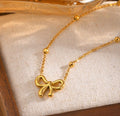 Golden Bow Charm Necklace