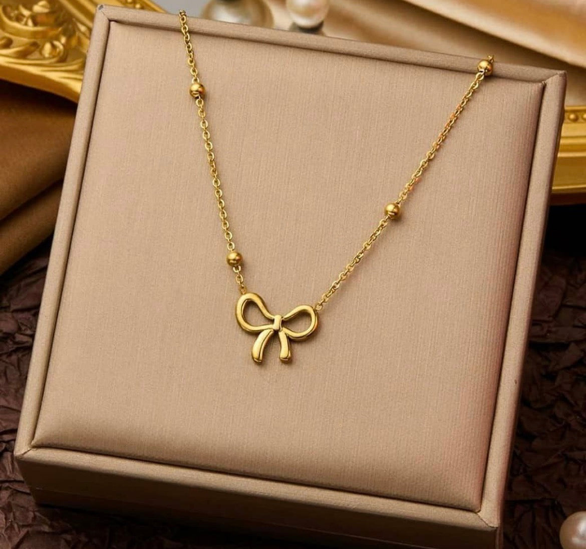 Golden Bow Charm Necklace